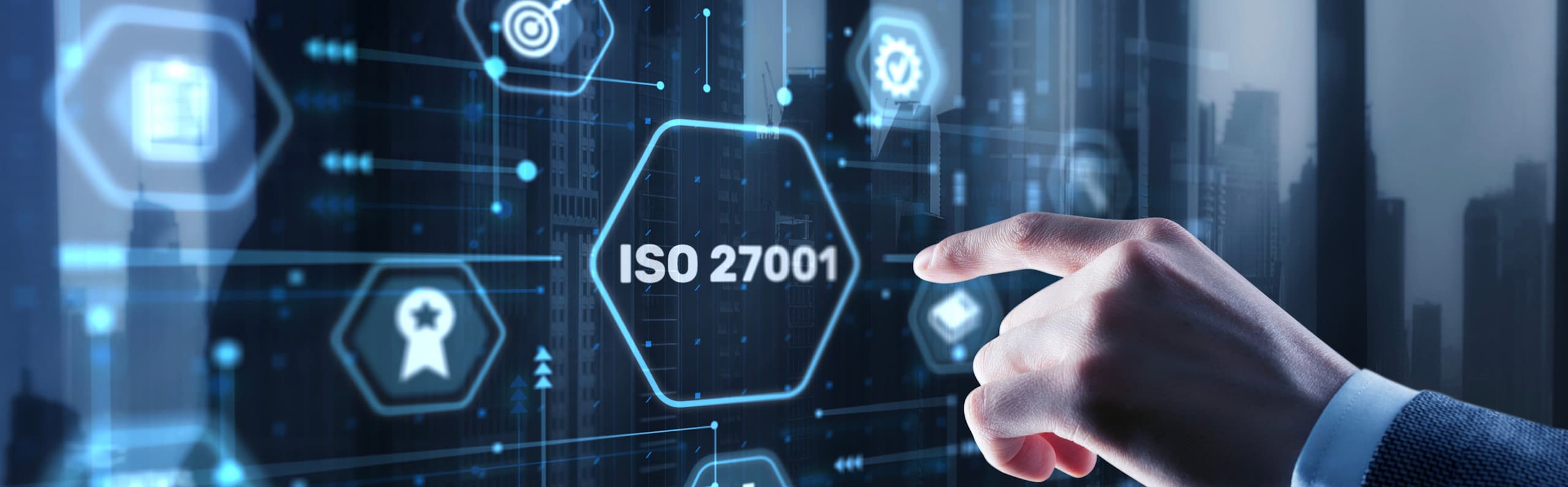 A close-up of a hand pointing at a futuristic digital screen displaying a glowing security keyhole icon and 'ISO 27001' compliance text.