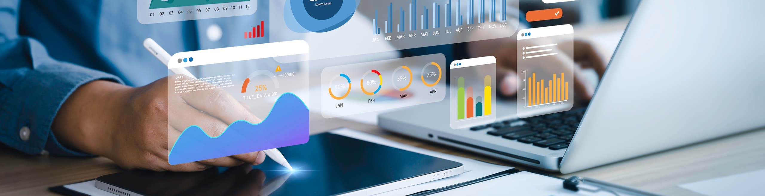 A close-up of hands typing on a laptop and using a tablet, overlaid with glowing digital graphs, bar charts, and data visualizations.