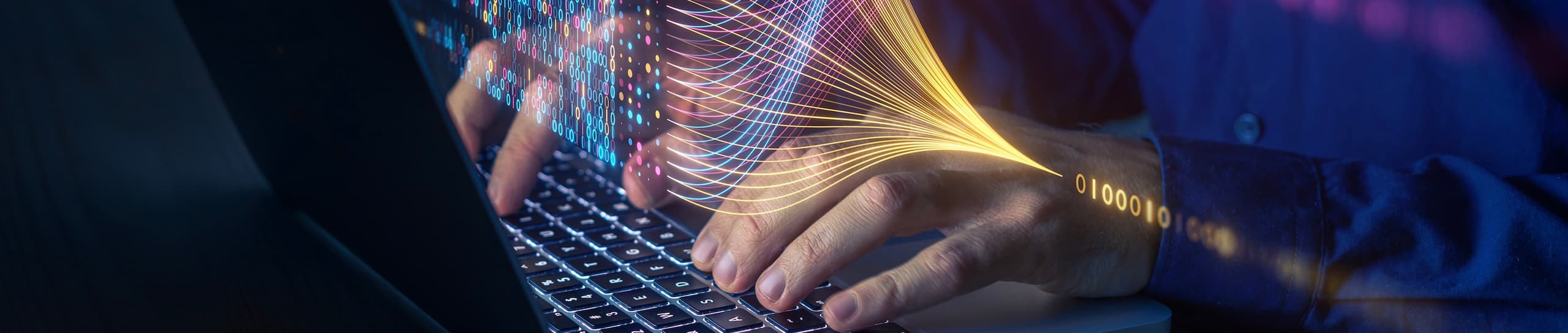 A close-up of hands typing on a laptop, with glowing yellow and purple data lines flowing out from the keyboard.